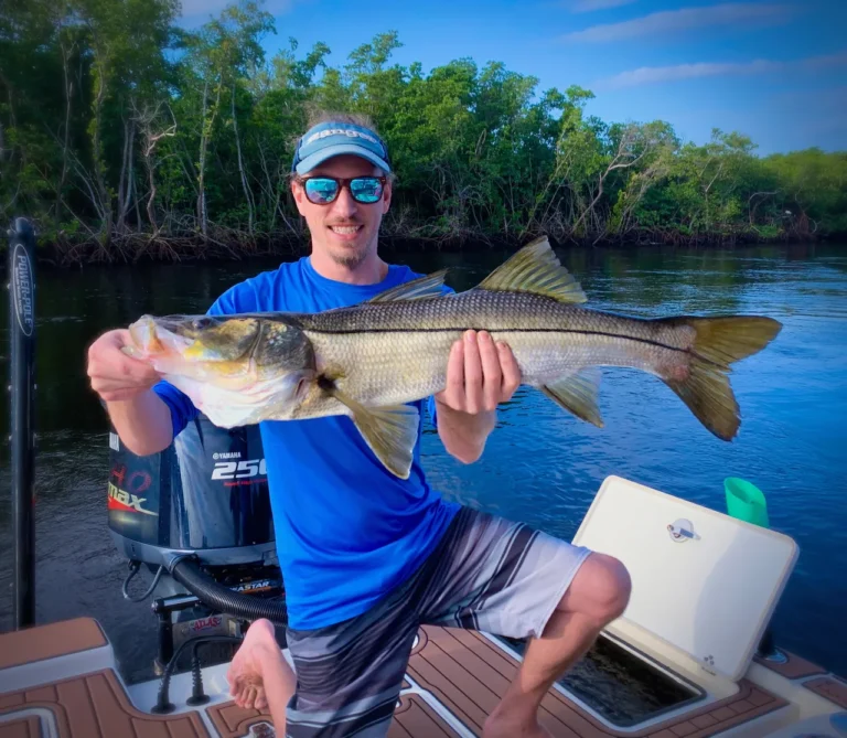 Andy holding a snook